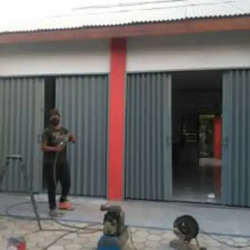 Folding gate rolling door