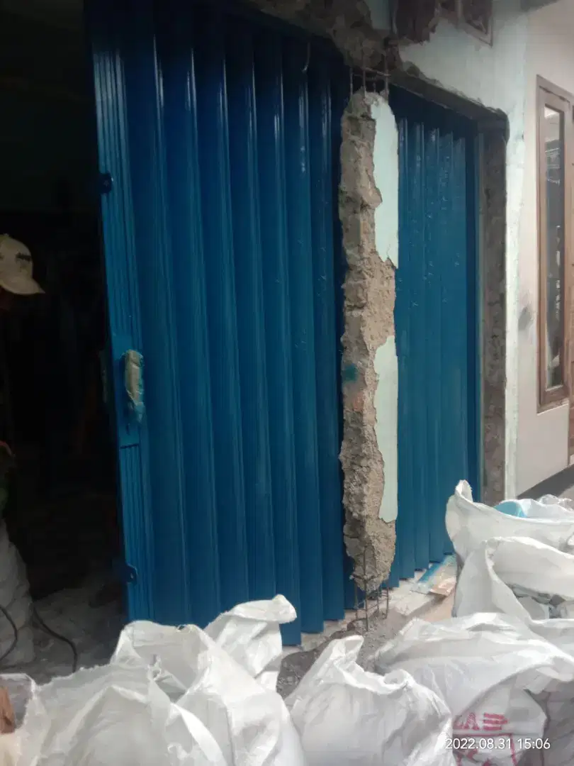 Tukang reparasi benerin rolling door folding gate