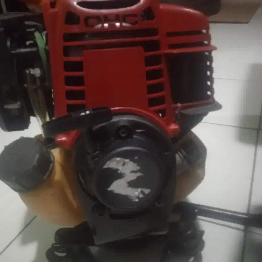 Mesin rumput 4 tak merk honda