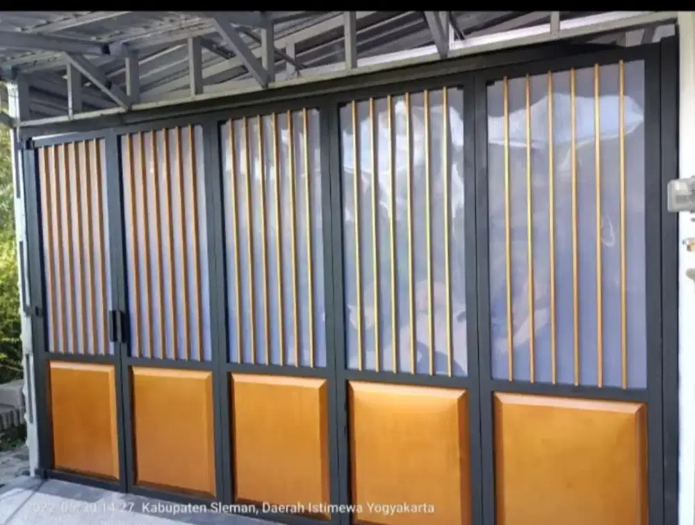 Pintu garasi lipat dan rel handerson