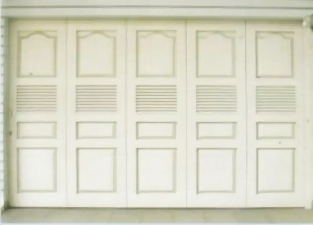 pintu gerasi dan ruko model lipat bahan full besi galvanis