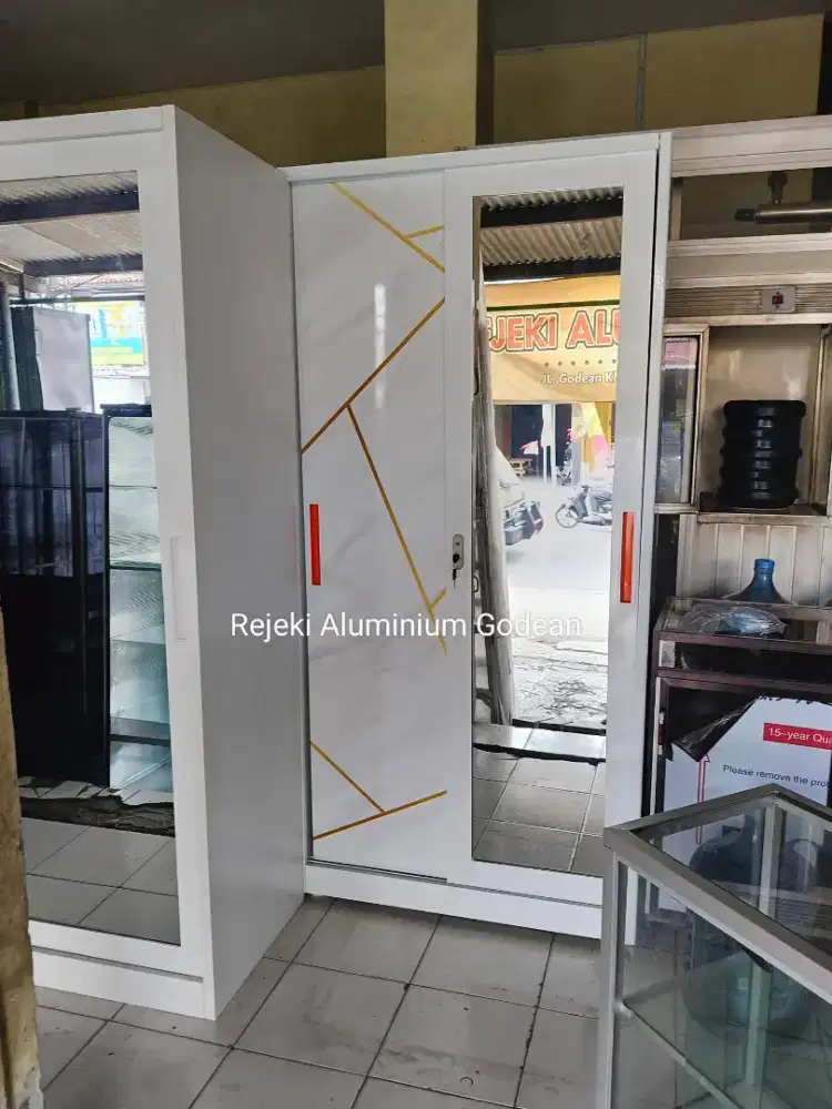 Lemari besi sliding ukuran 90