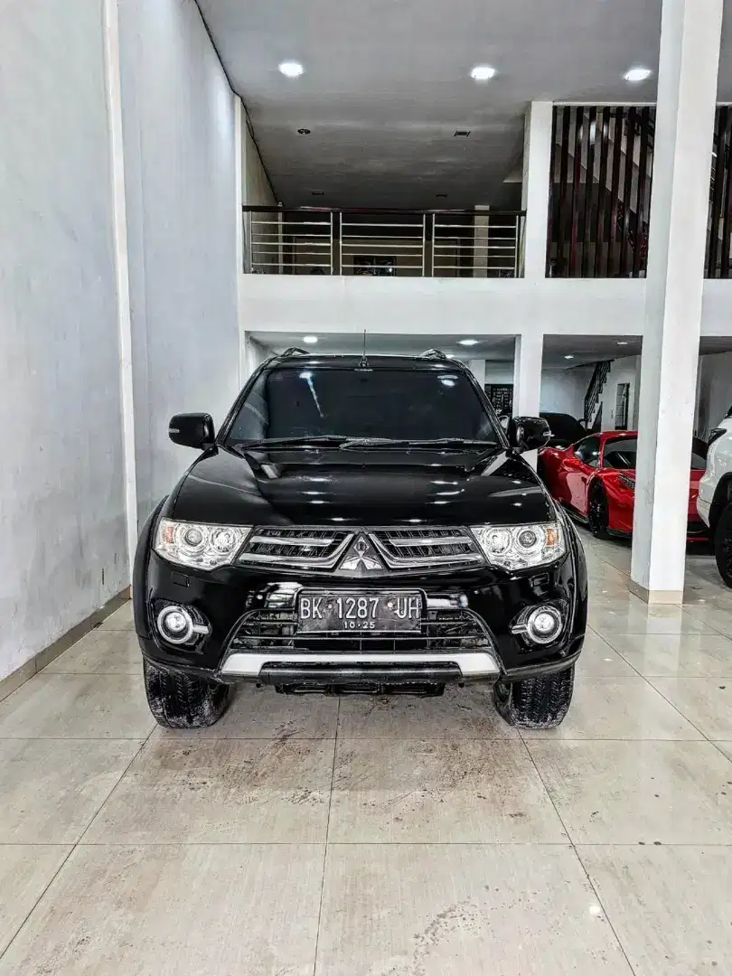 (TDP 19JT) PAJERO SPORT 3.0 DAKAR Bensin 2014 / 2015 hitam fortuner