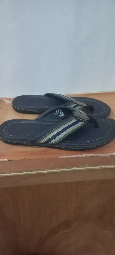 Sendal model Jepit Yongki Komaladi