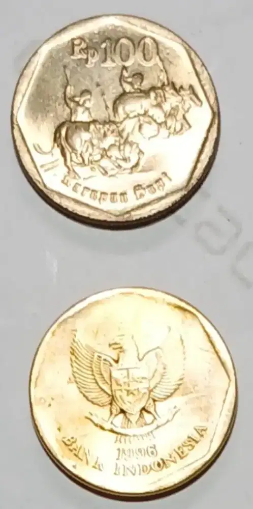 Uang coin karapan sapi Rp100 1996