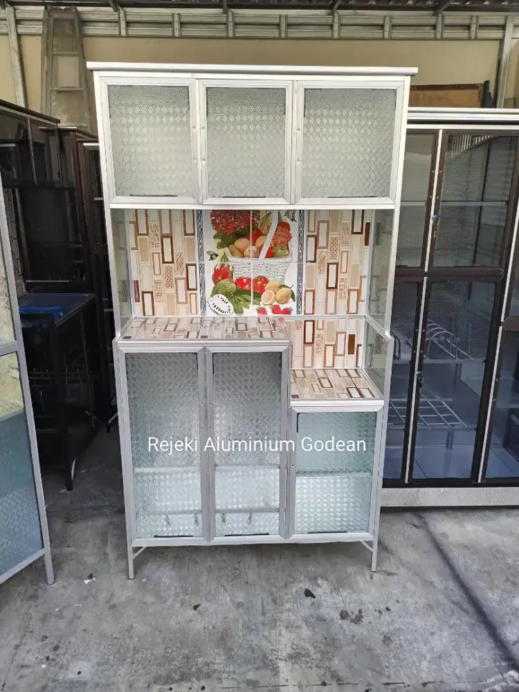 Rak piring 3 pintu keramik kaca es murah