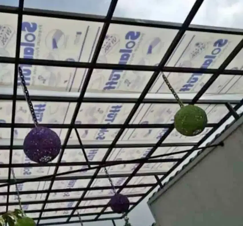 Kanopi atap solarplat bening rangka besi holloh galpanis