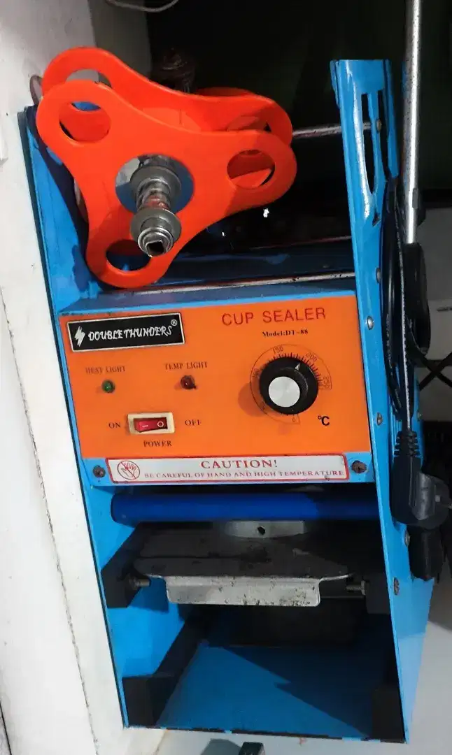 Mesin cup sealer