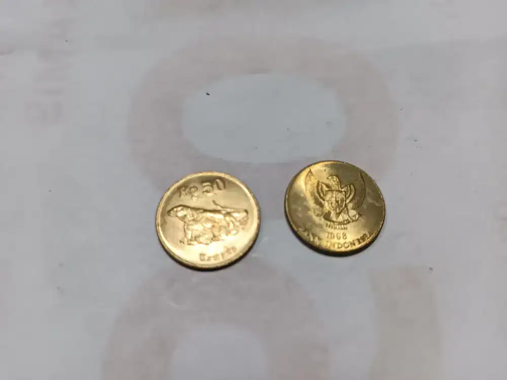 Koin emas 50 komodo