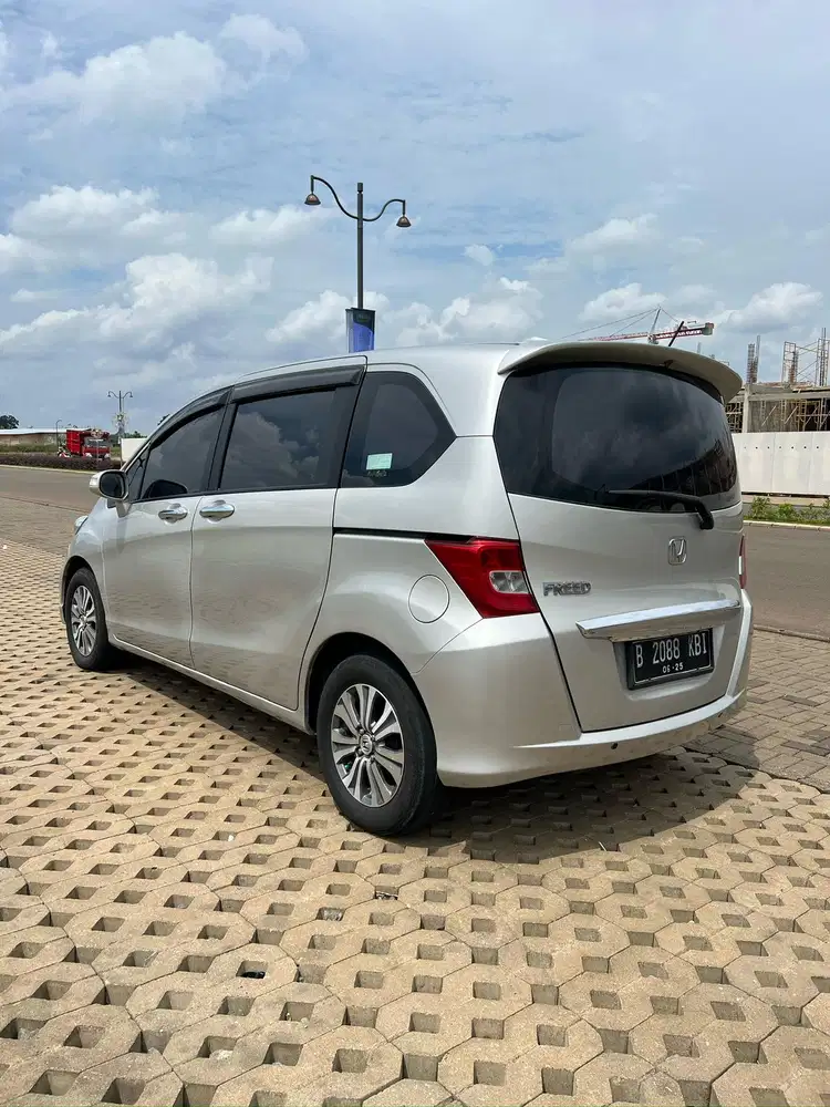 KREDIT SYARIAH FREED SD AT DOUBLE BLOWER  2013