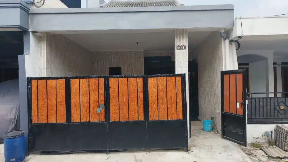 MURAH!! Dikontrakan Cepat Rumah Dua Lantai di Perum Telaga Murni