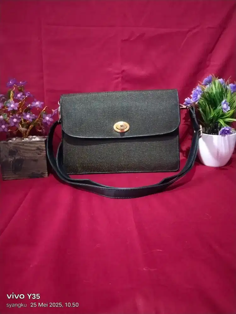 Nina ricci sling bag