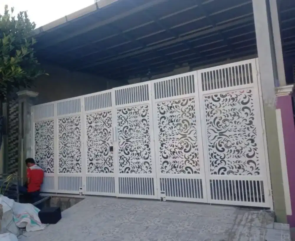 Pagar gerbang cutting laser moderen terbaru bergeransi