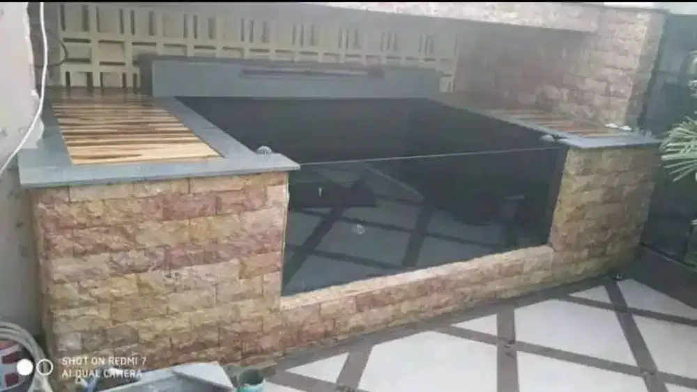 Kolam minimalis batu alam