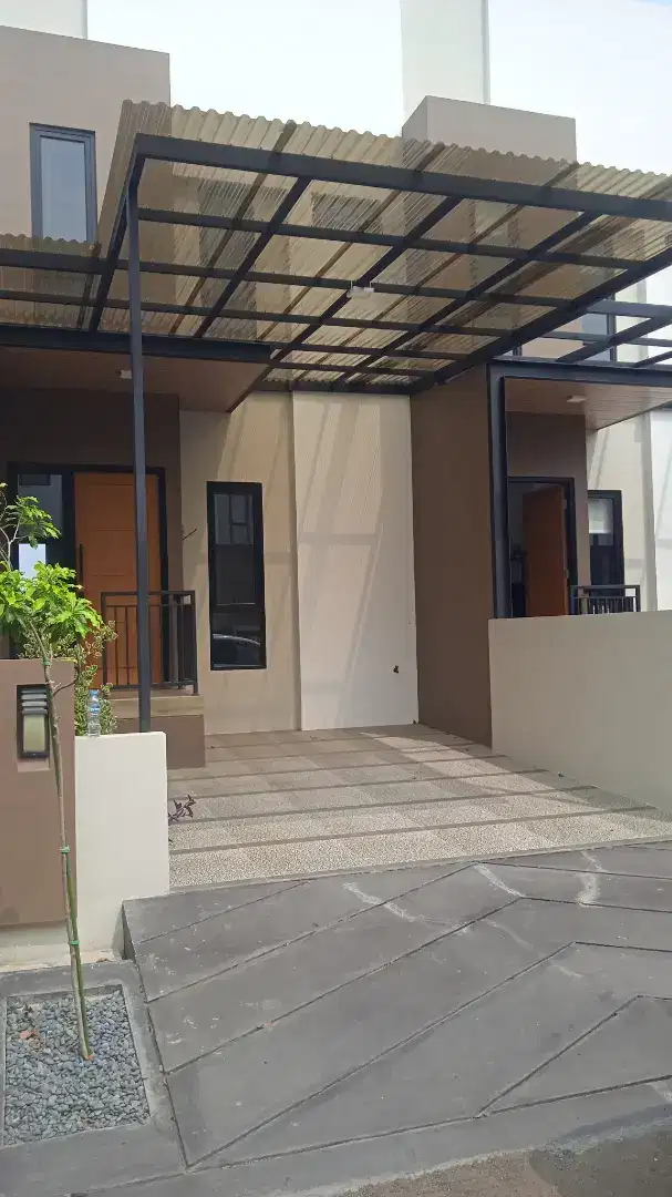 Rumah cluster dalam perumahan besar di kemang pratama bebas banjir