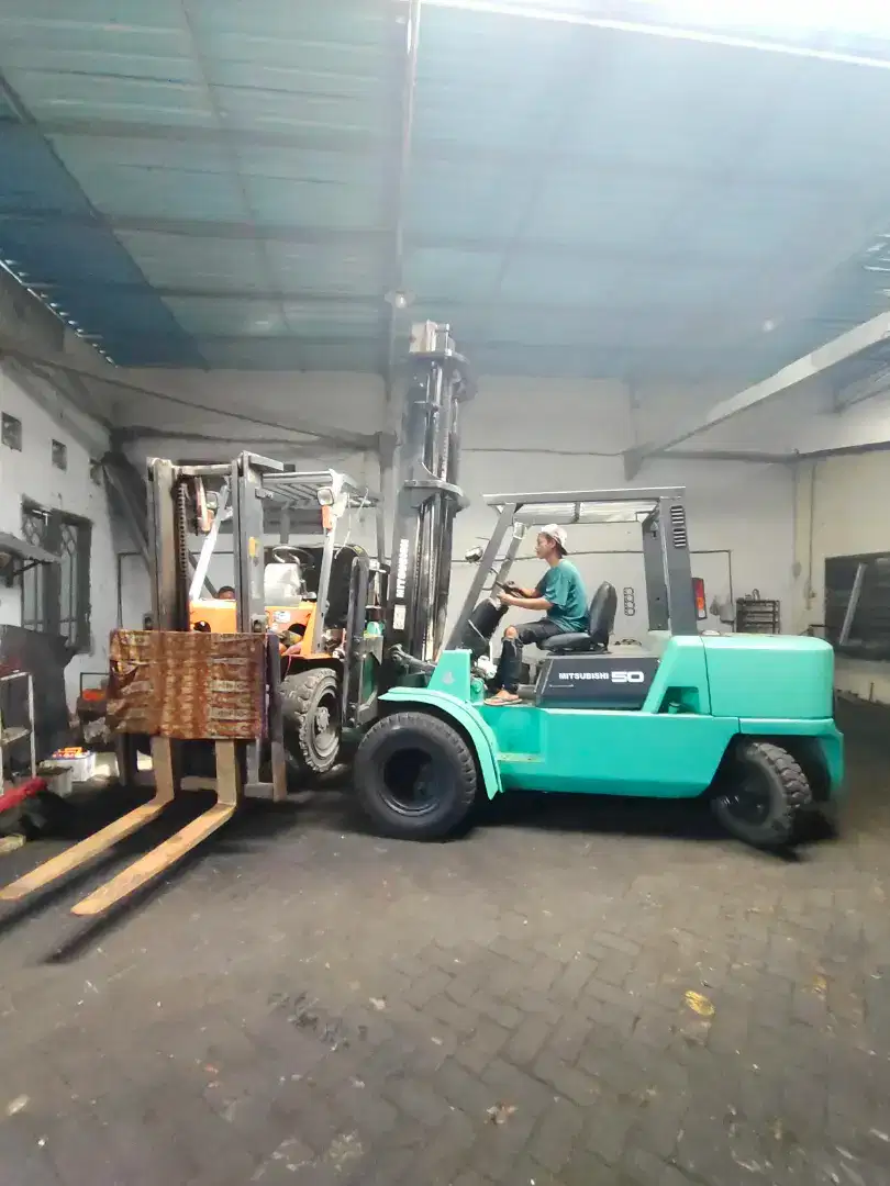 Forklift Mitsubishi 5  ton ban double