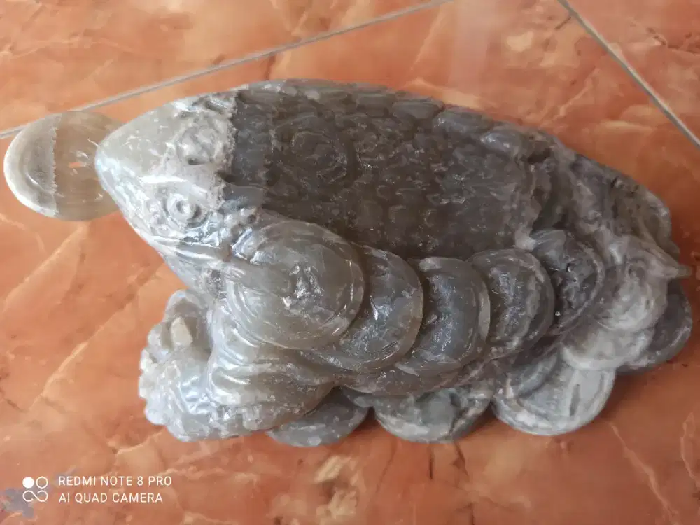 Patung kodok coin batu onik