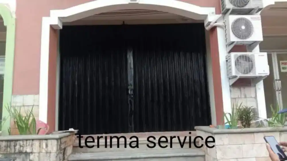 Rolling door folding gate