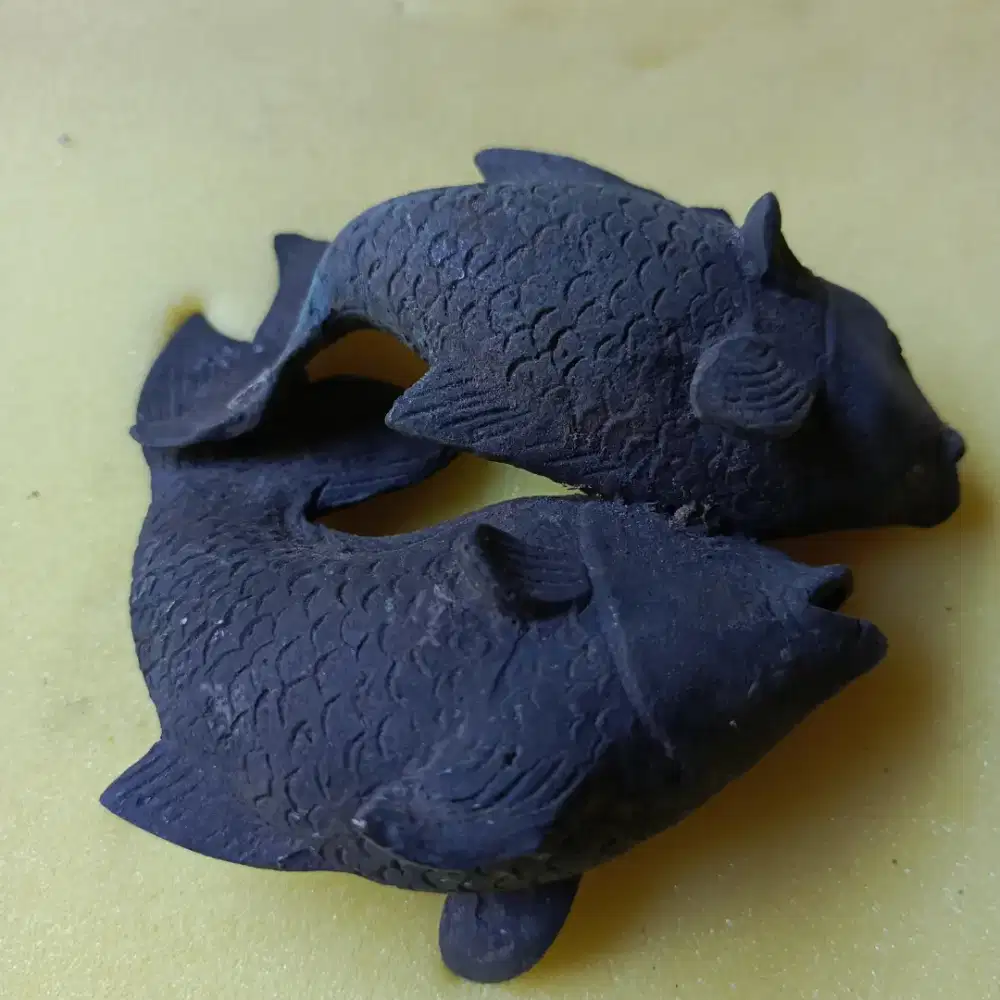 Patung ikan jadul kuno dan antik