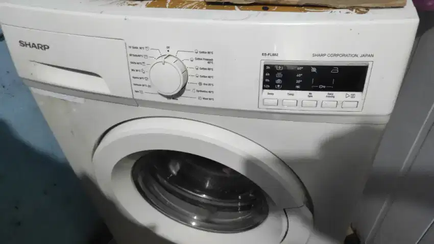 Mesin Cuci Sharp front Loading Midul eror