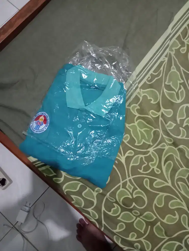 baju hijau kemenpora