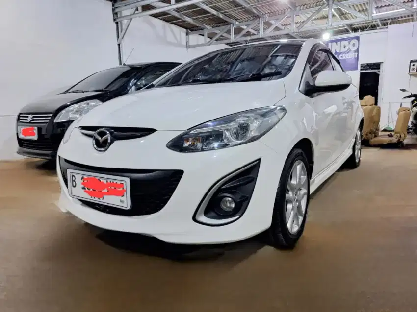 Dp 3 jt Mazda R a/t 2013 dibantu