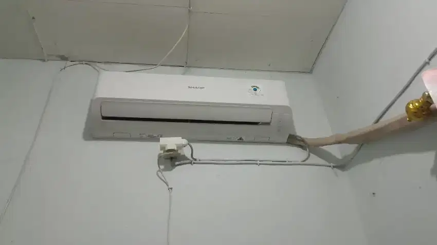 AC Sharp R32 mulus jarang pakai