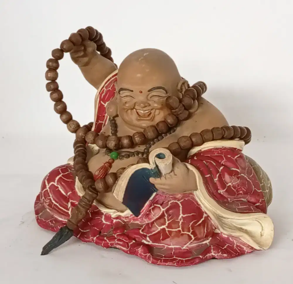 Patung Budha Berkalung