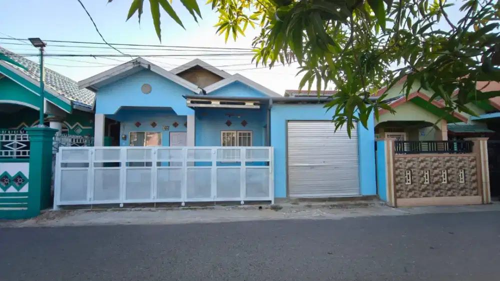 Di sewakan rumah type 65 tanah 90 sudah termasuk kios
