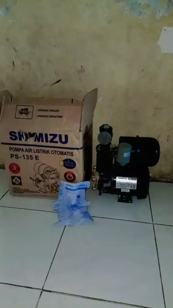 Pasang pipa air dan pompa air/tandon