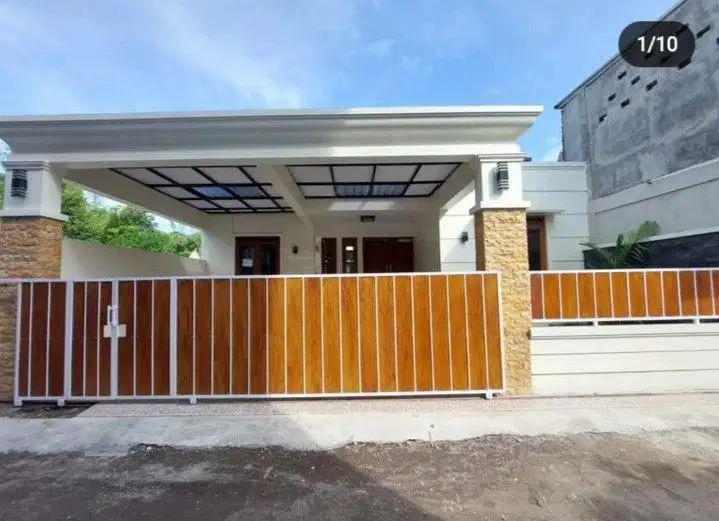 Pagar motif grc serat kayu minimalis