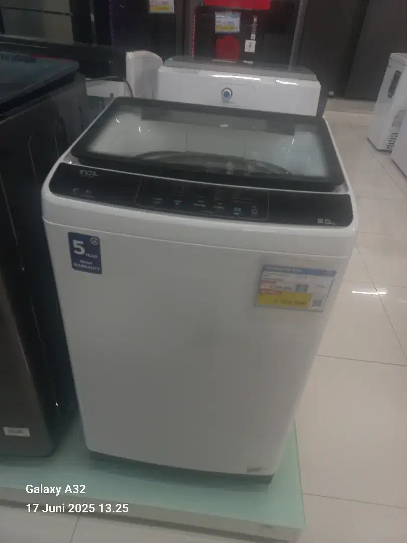 Mesin cuci top loading tcl