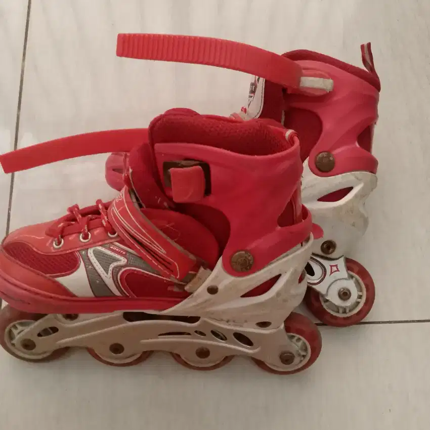 Sepatu roda power aosite merah