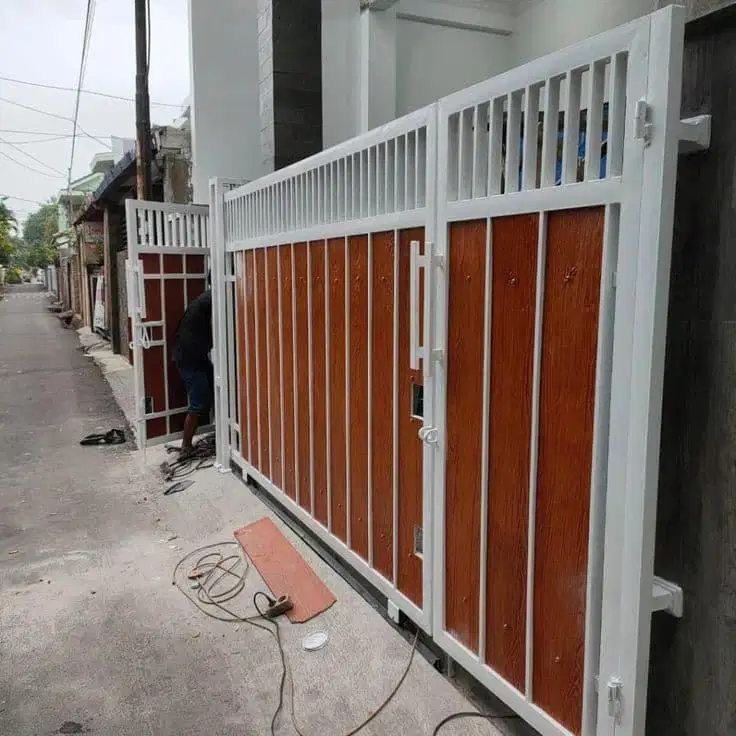 Pagar motif grc serat kayu minimalis