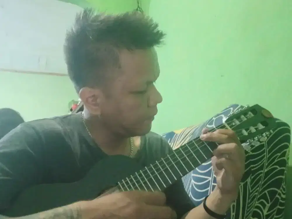 Gitar mini lele merk mandalika