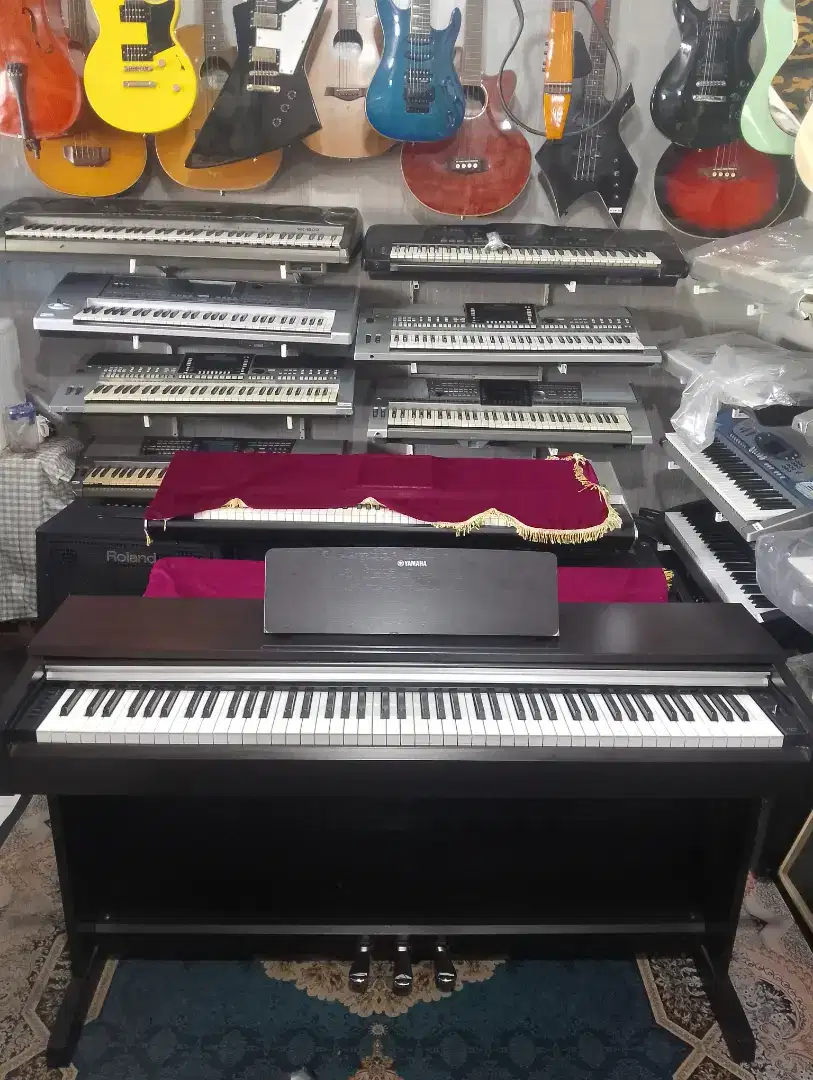 Piano digital ARIUS YDP-142