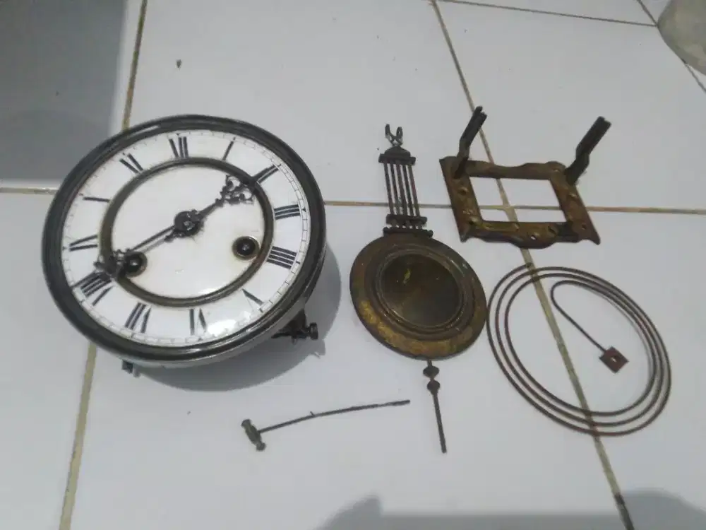 Part jam dinding RA antik