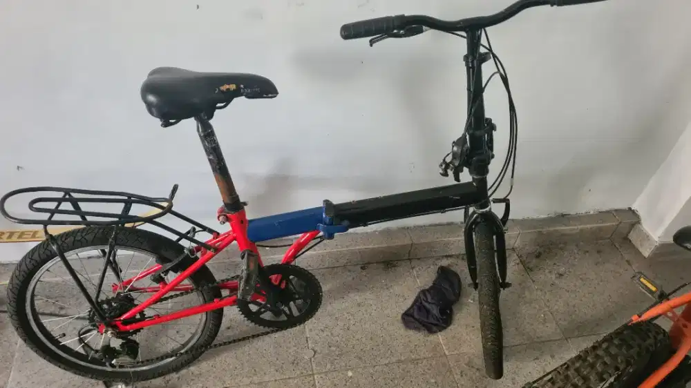 Sepeda lipat minus dikit