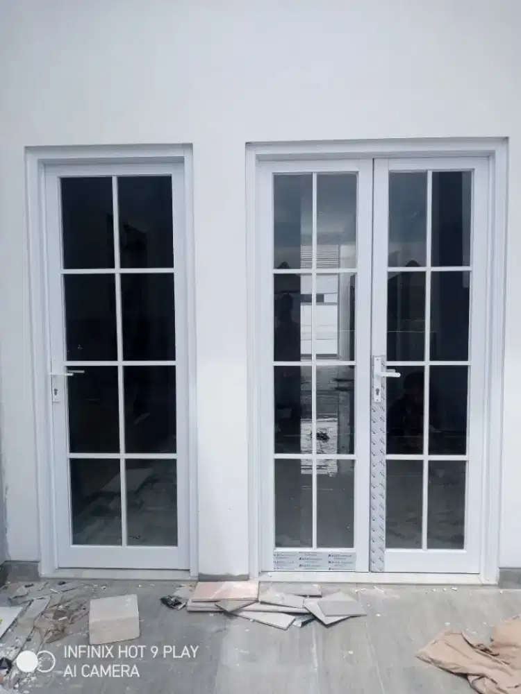 Kusen alumunium dan kaca