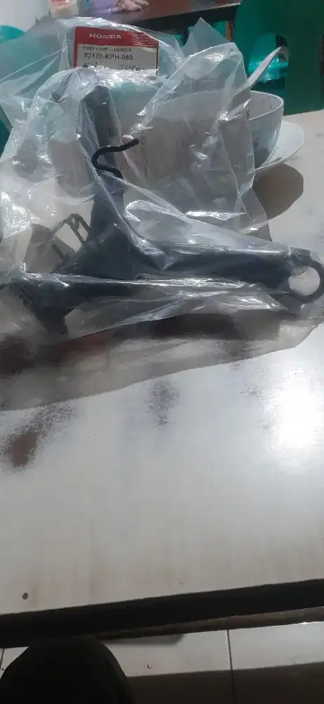 Dudukkan segitiga stang stir supra x125