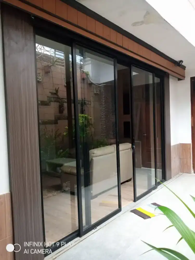 Kusen alumunium dan kaca