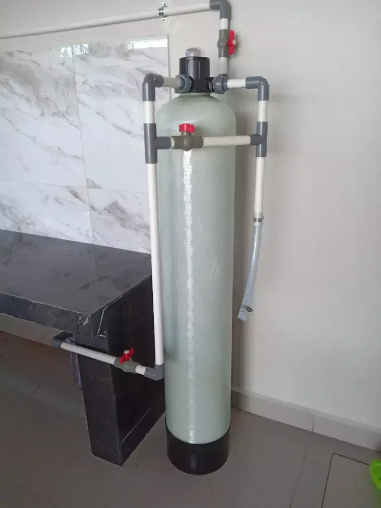 Pasang tabung filter air cuci Tandon dan ganti media