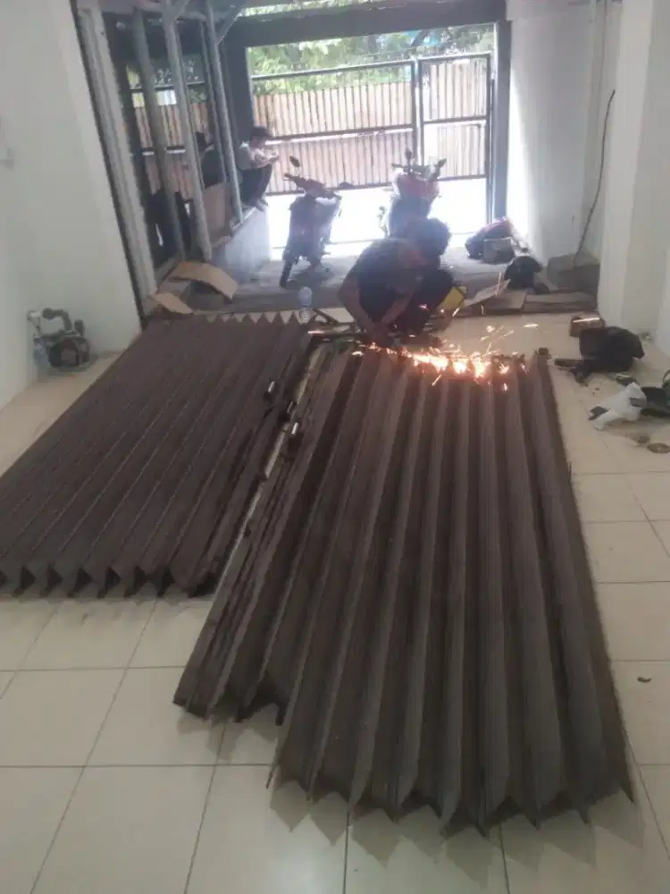 ahli perbaikan reparasi rolling door folding gate murah