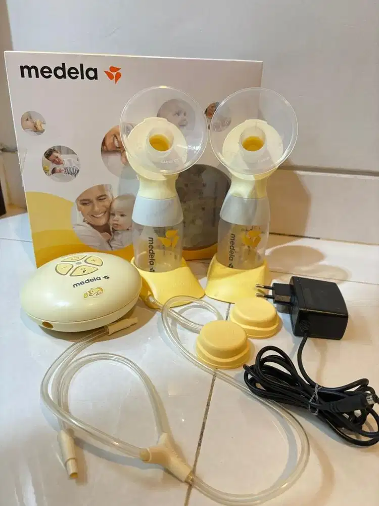 Medela double breast pump good condition. Spare part lengkap ada box