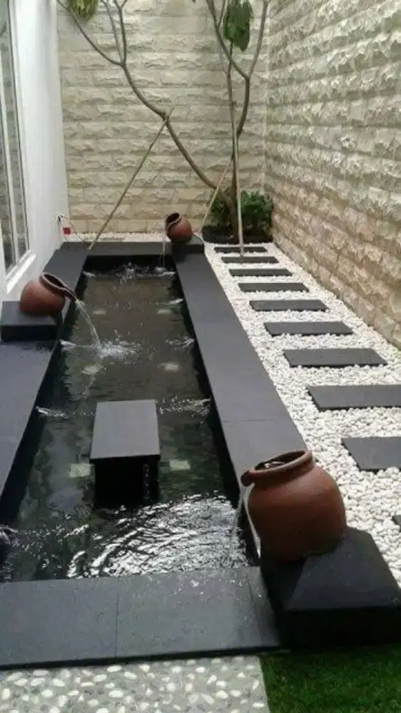 Kolam ikan minimalis dan taman