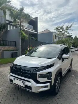 Very low km9rb! Xpander Cross Prem 2024 reg. Tgn 1 dr bru Expander