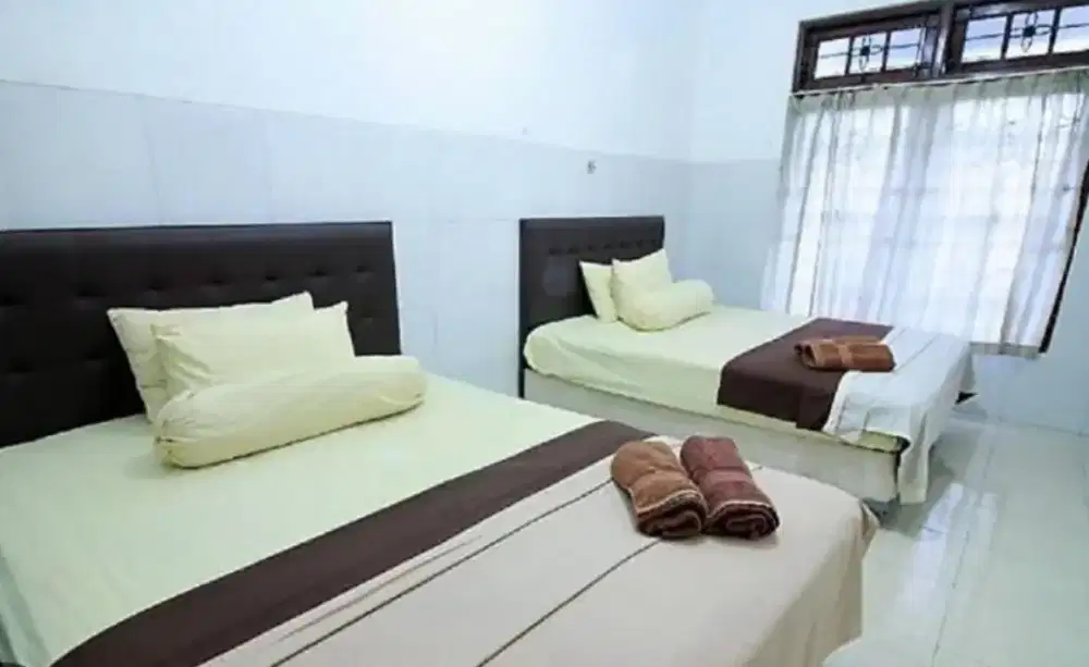 Staf/Karyawan Guesthouse (Homestay)