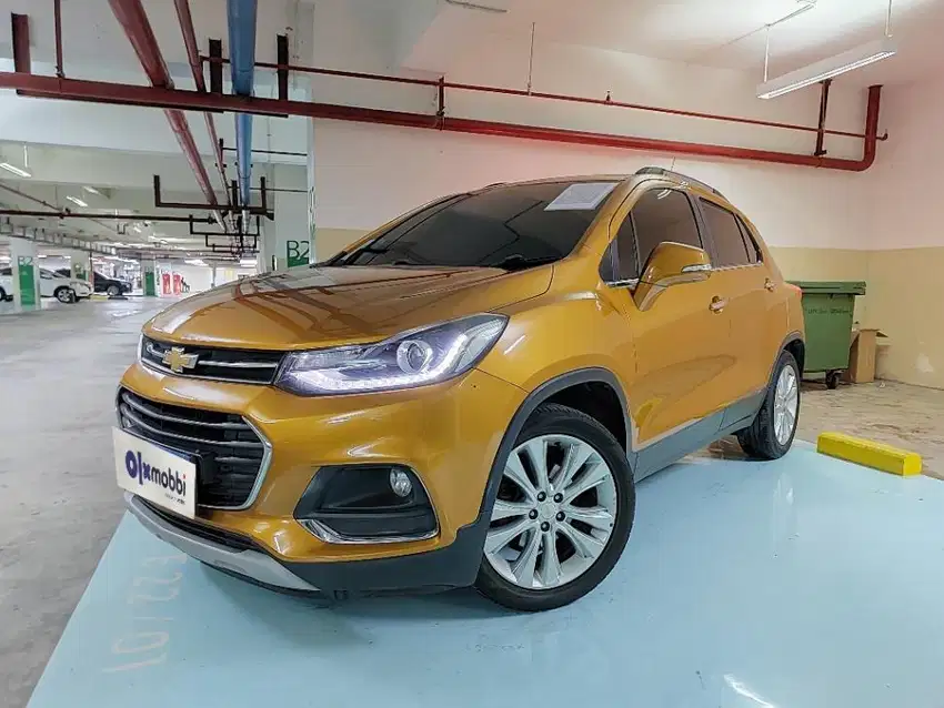 TDP 9,JT Chevrolet Trax 1.4 Premier Bensin-AT Orange 2018