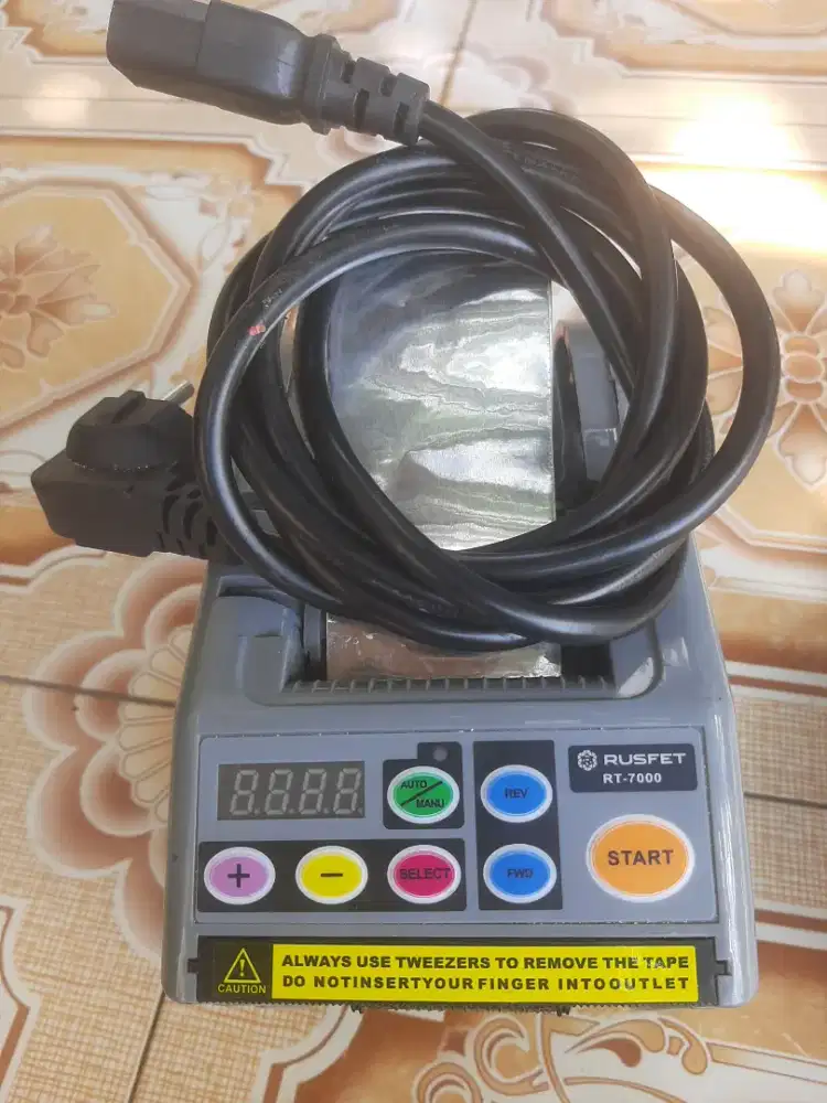 Mesin potong lakban otomatis