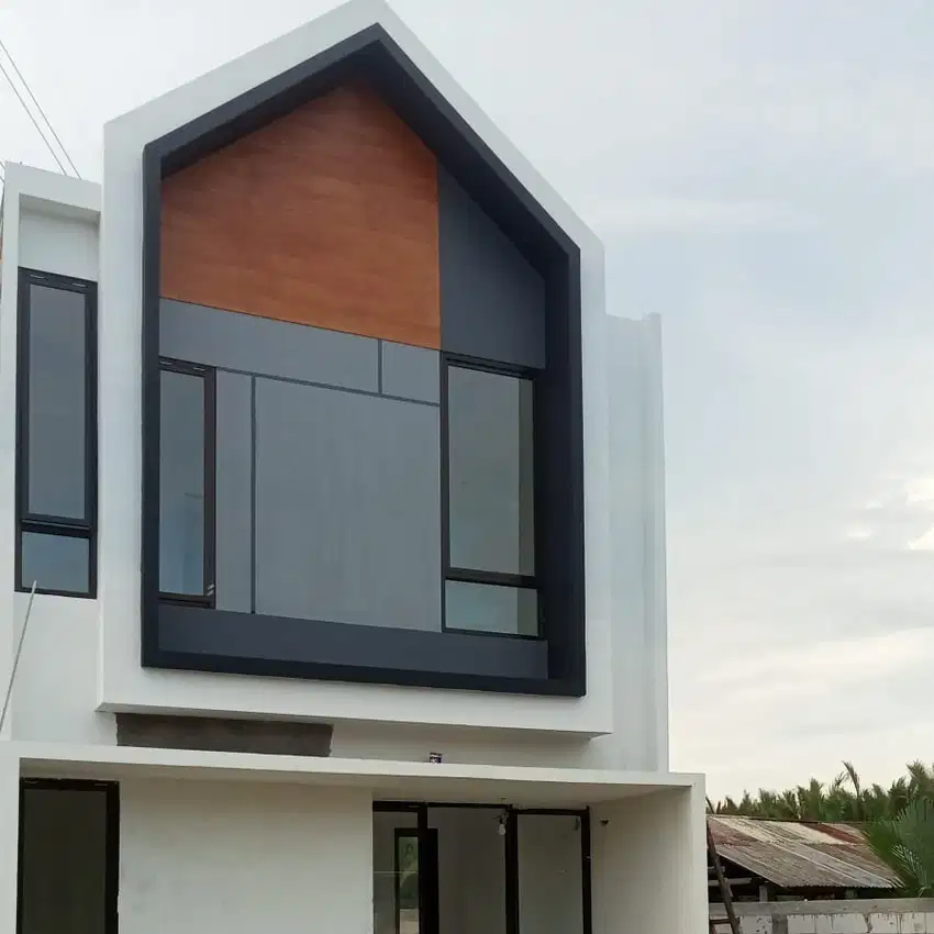 Rumah dua lantai di  tengah kota  makassar